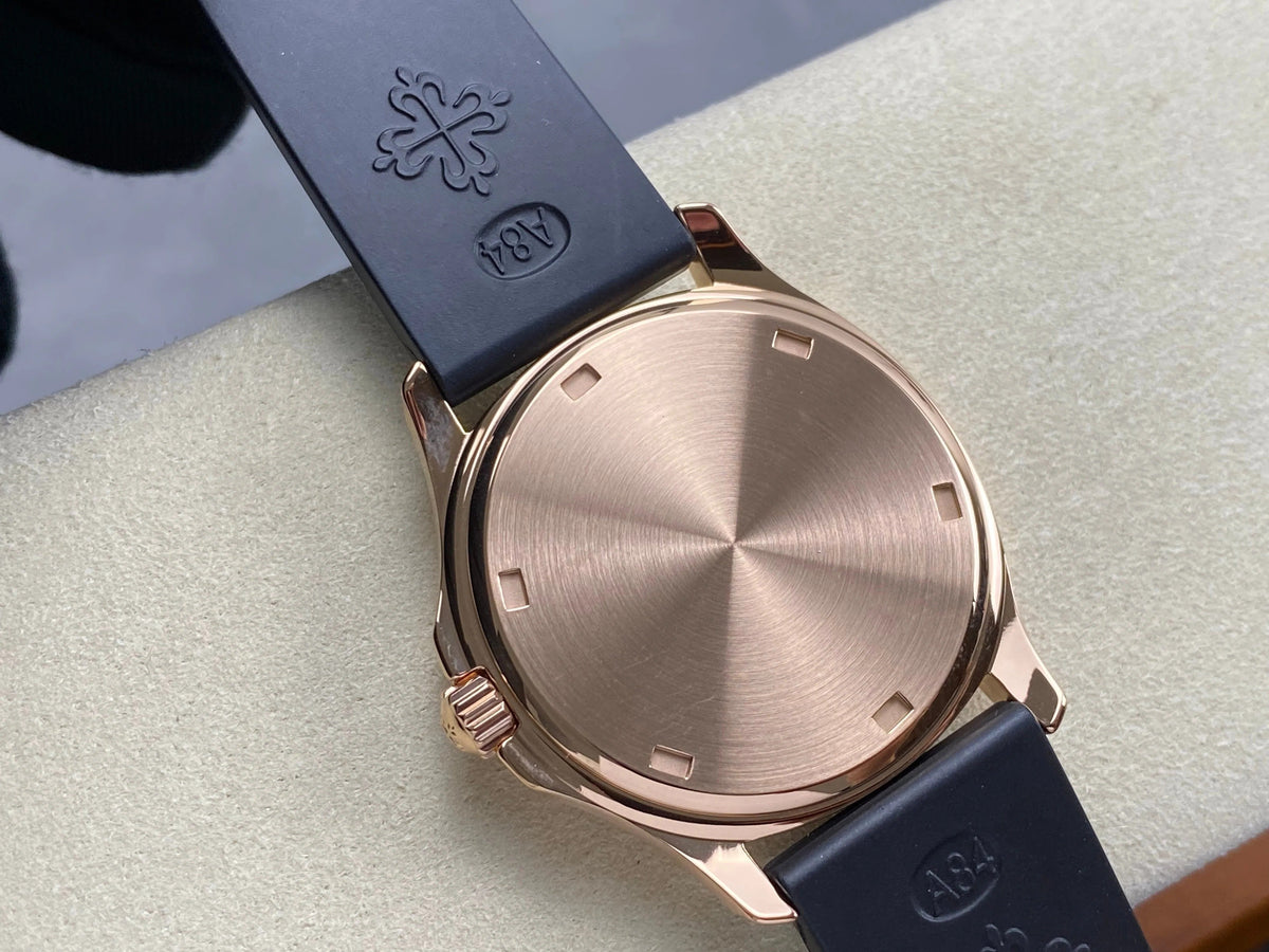 Patek Philippe Aquanaut 36mm Pink Gold Case Diamond Bezel Black Rubber Strap