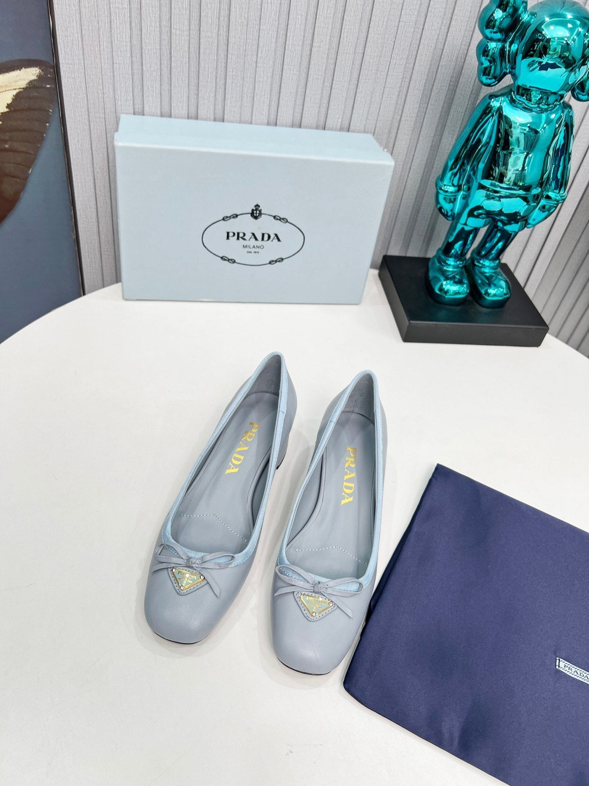 Prada 26s Round Toe Pumps Block Heel 40mm In Light Blue Calfskin With Bow