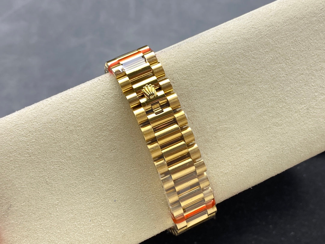 Rolex Day-Date 36mm Gold Orange Dial